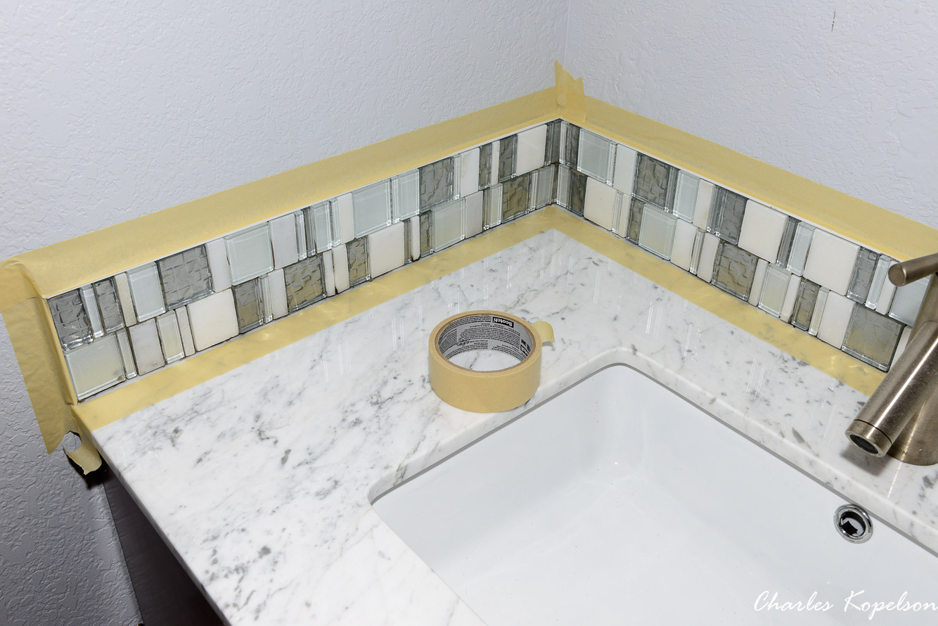 Masking makes cleanup much easier especially when you get grout on the painted areas.