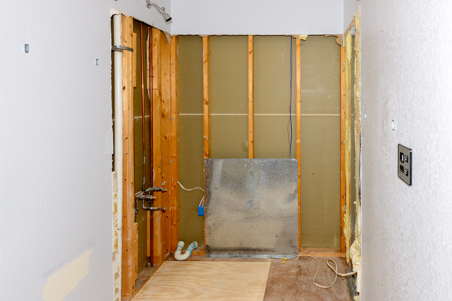 All cleaned up.  I still have to trim some of the drywall.  Notice the plywood now covering the hole in the floor.