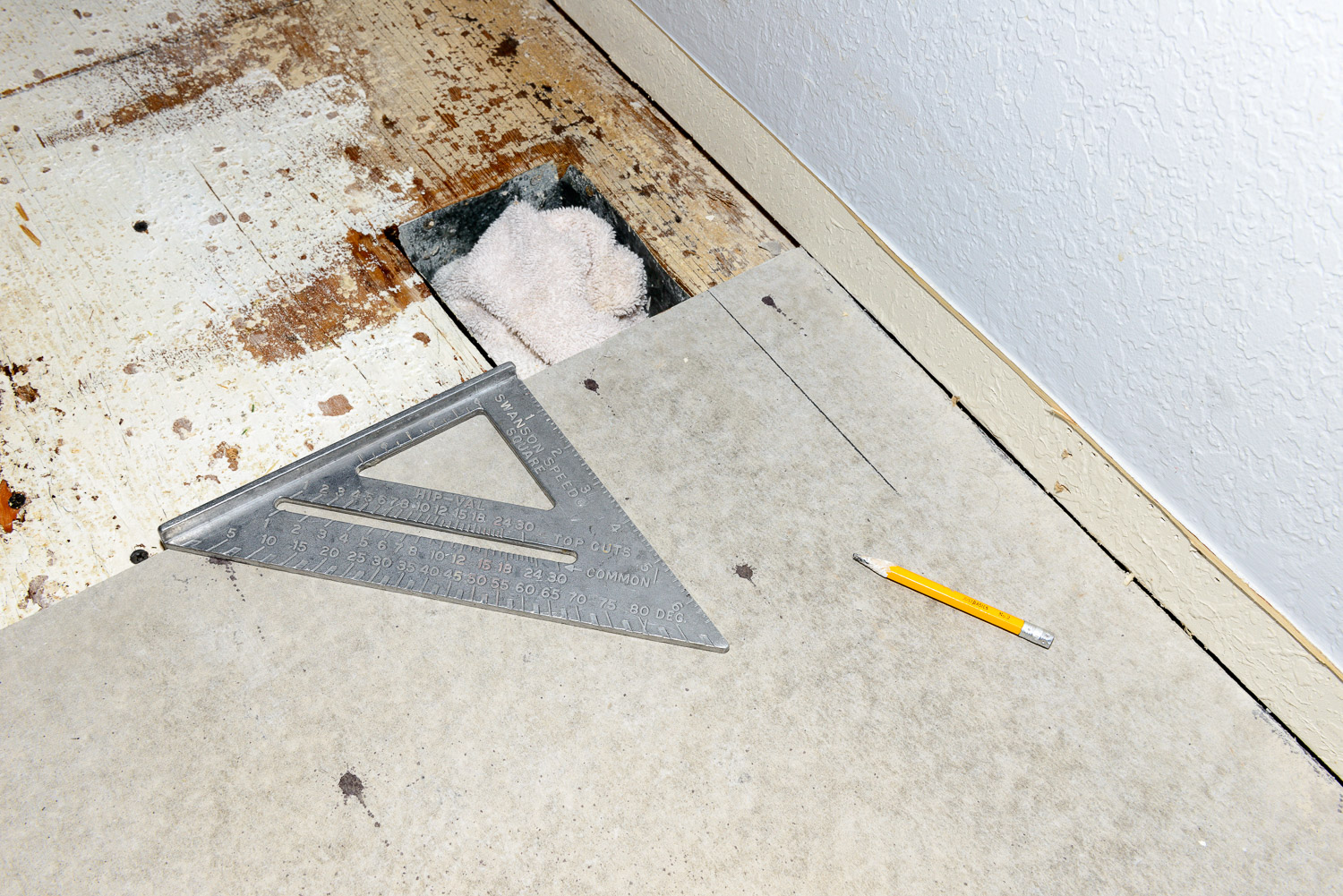Lay out the cutout for the vent with a square